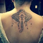 Elephant neck tattoo