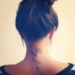 Script neck tattoo